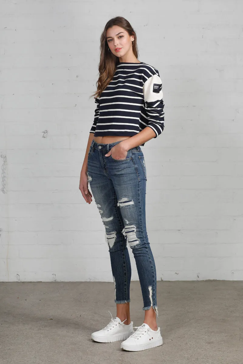 Conspicuous Mid Rise Ankle Skinny Jeans