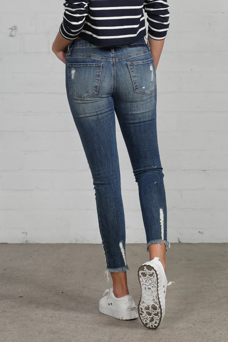 Conspicuous Mid Rise Ankle Skinny Jeans