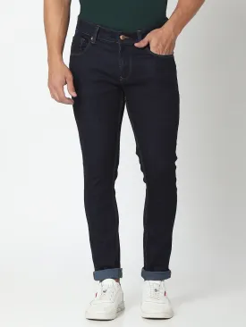 Spykar Raw Blue Cotton Slim Fit Tapered Length Jeans For Men (Kano)